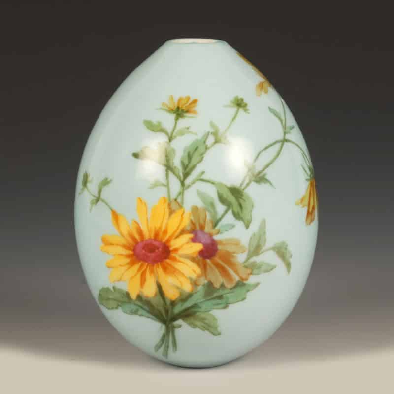 A large Russian Imperial Porcelain Easter egg with yellow daisies