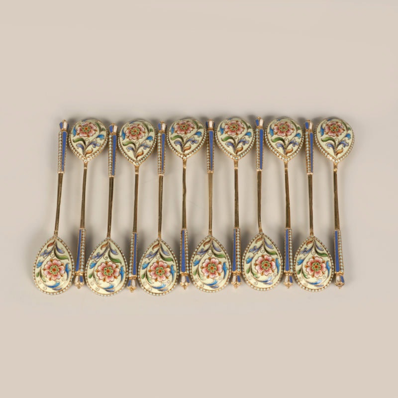 A set of 12 shaded cloisonné enamel spoons by Feodor Rückert
