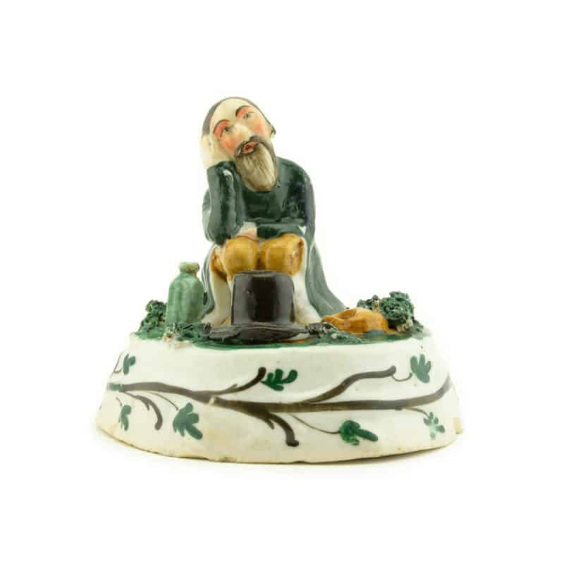 Russian Porcelain Figurine Seated Peasant