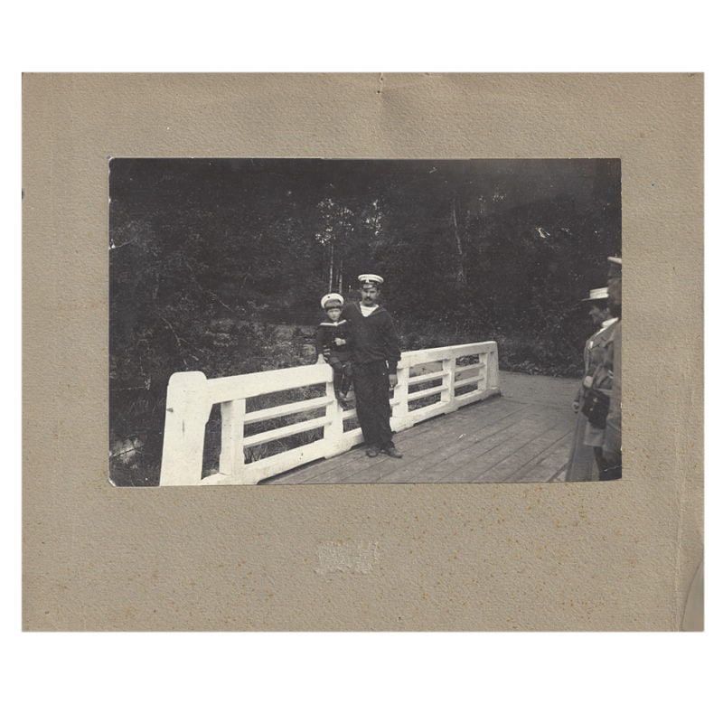 Photograph of Tsarevich Alexei Nikolaevich with "Sailor Nanny" Andrei Derevenko