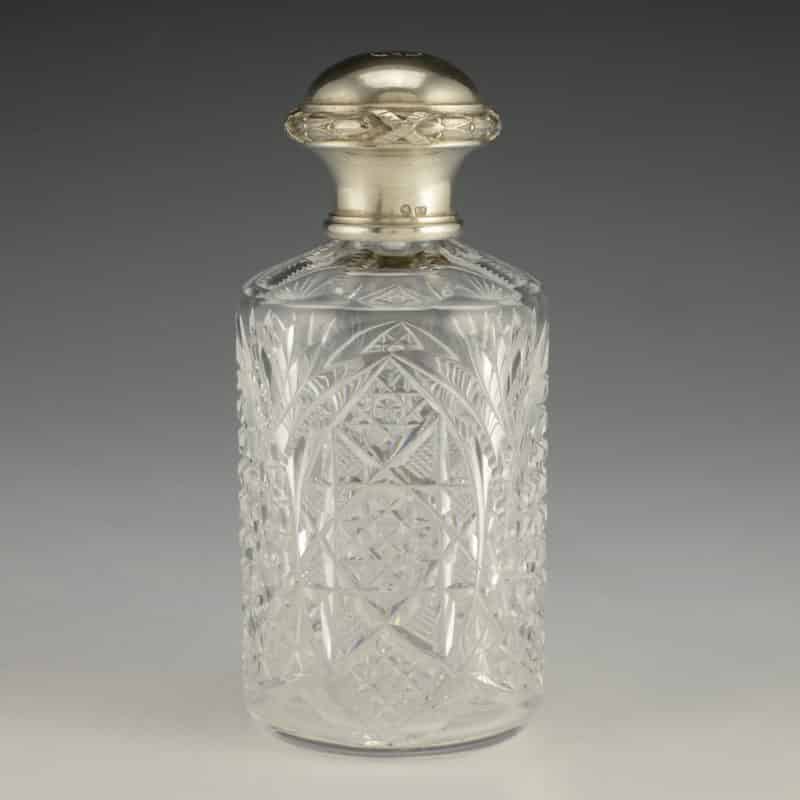 Fabergé silver-mounted cut glass scent bottle