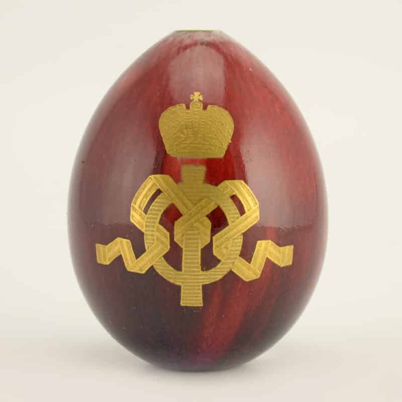 Russian Imperial Porcelain presentation oxblood Easter egg with the gilt cypher of Maria Feodorovna