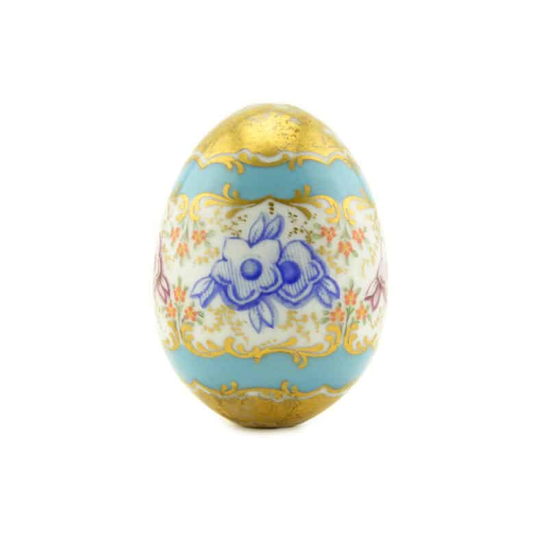 An antique Russian porcelain Easter egg in the style of the Rococo Revival