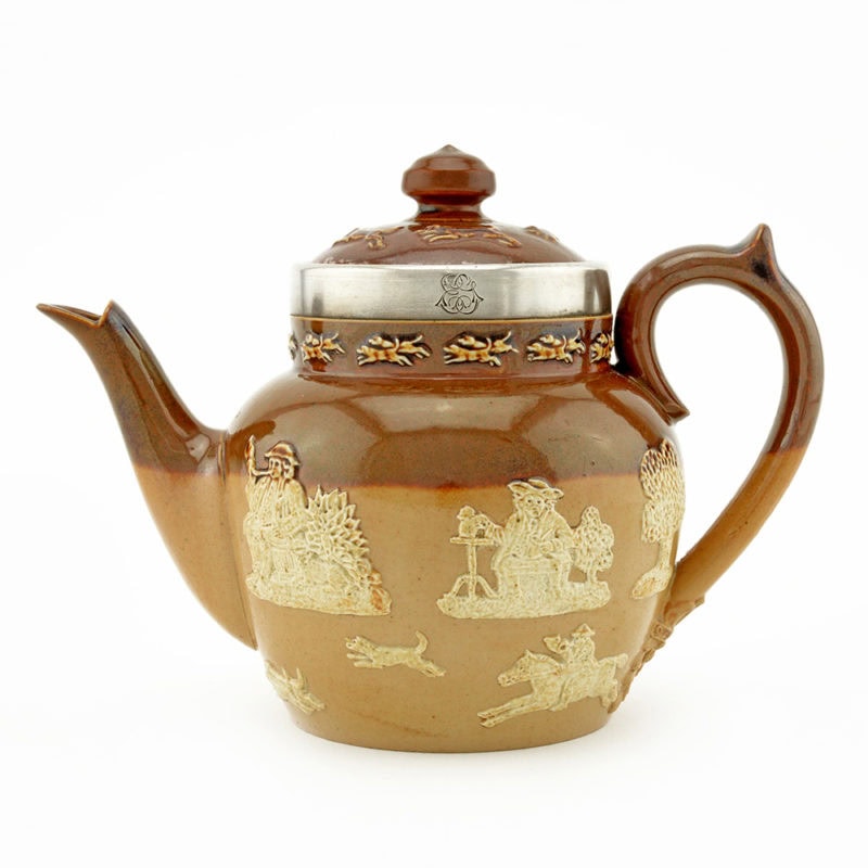 A Fabergé silver-mounted Doulton Lambeth teapot