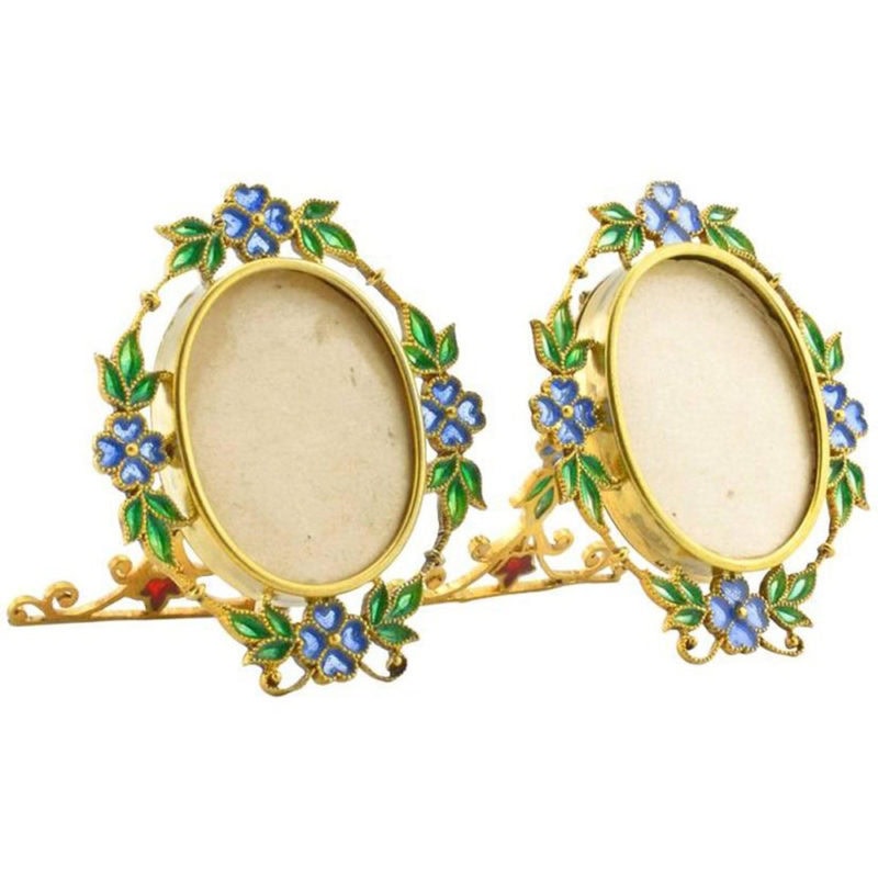 A pair of Austrian gilded silver & plique-a-jour enamel miniature photograph frames by Georg Adam Scheid