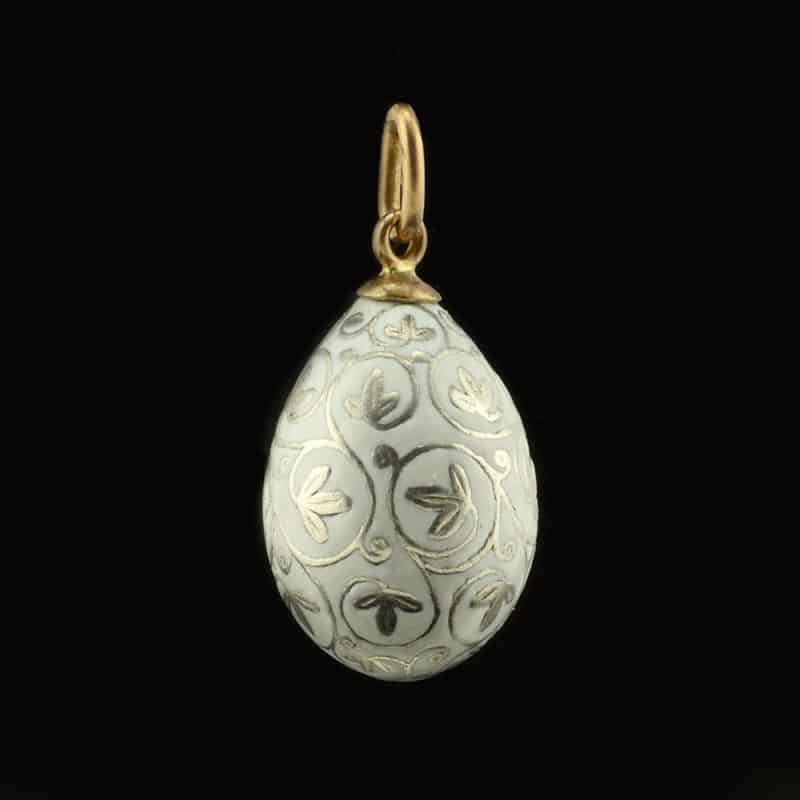 A Russian gold-mounted silver & opaque enamel miniature pendant egg - Image 2
