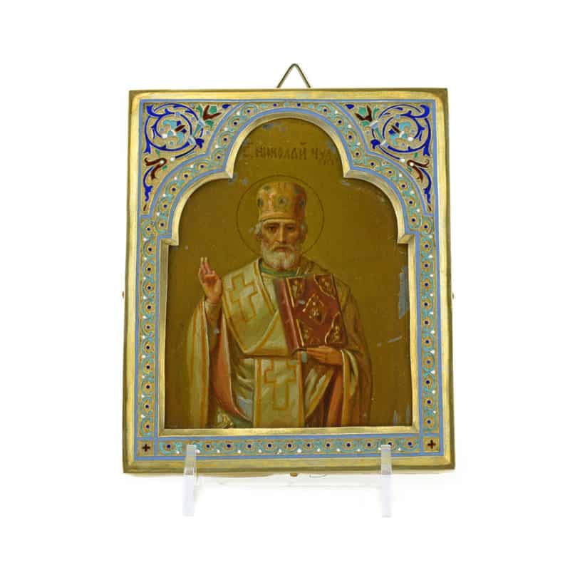 An antique Russian icon of St Nicholas the Wonderworker with silver & cloisonné enamel oklad by Antip Kuzmichev