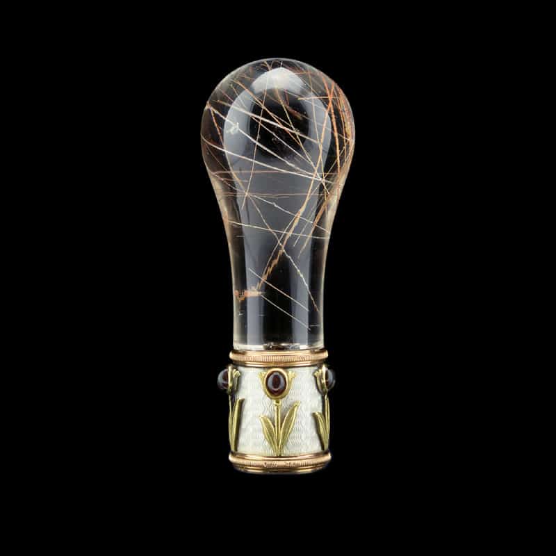 A Fabergé carved rutilated quartz parasol handle with a jeweled gold & guilloché enamel mount by Michael Perchin