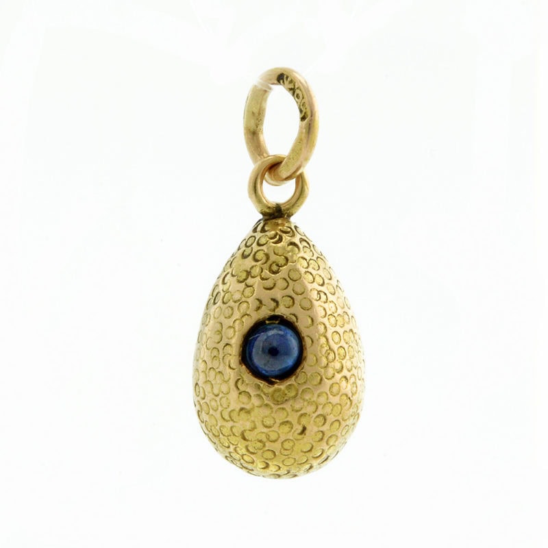 An antique Russian gold & sapphire pendant egg