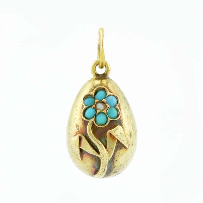 An antique Russian turquoise & pearl-set gold miniature pendant egg