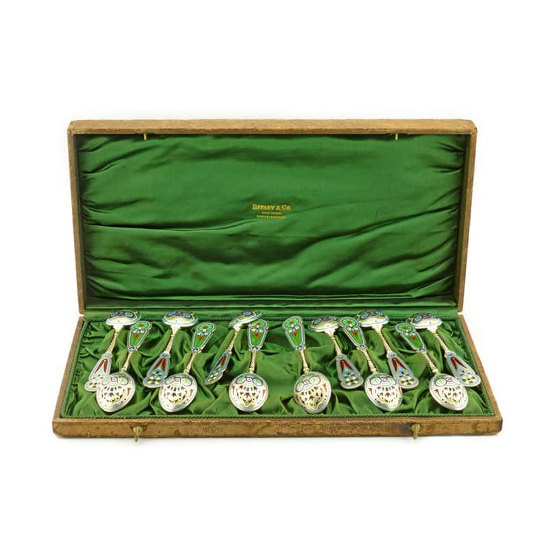 A set of twelve gilded silver, champlevé, guilloché, & plique-à-jour enamel spoons in fitted box, Khlebnikov for Tiffany & Co.