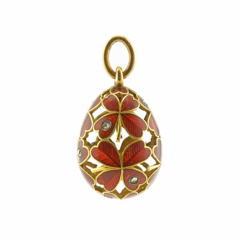 A Russian diamond-set, gold & enamel pendant egg in a form of a four leaf clover
