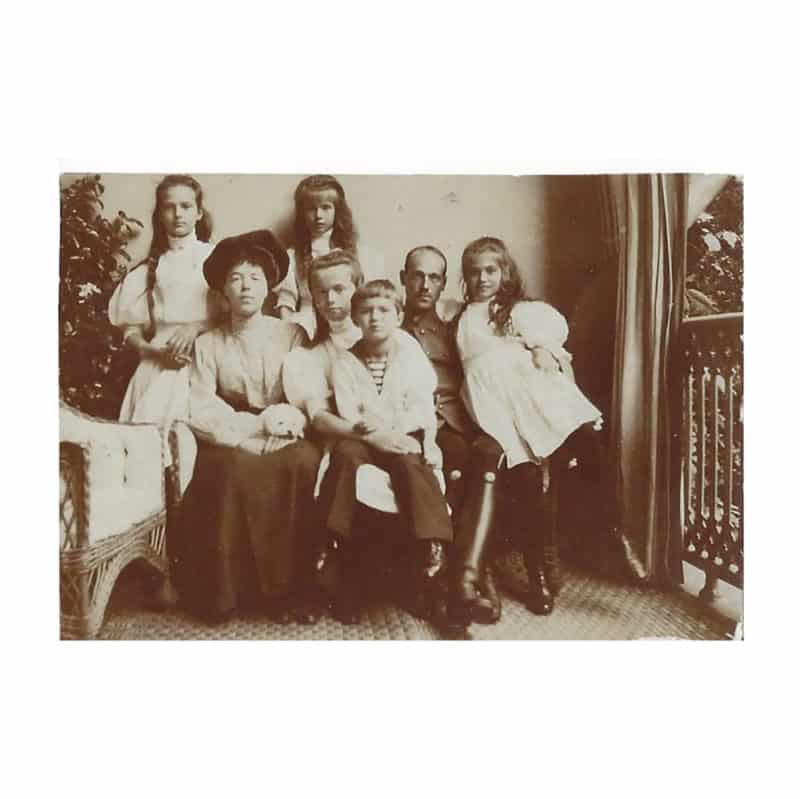 A photograph of Grand Duchess Olga, Grand Duke Michael, & possibly the 4 Imperial children.
