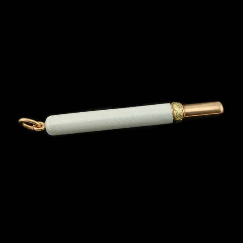 A Faberge  gold mounted silver gilt and guilloche enamel pencil