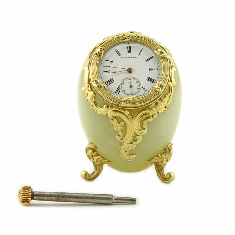 A Faberge Bowenite and Silver Figural Egg-Shaped Desk Clock, Michael Perchin - Image 3
