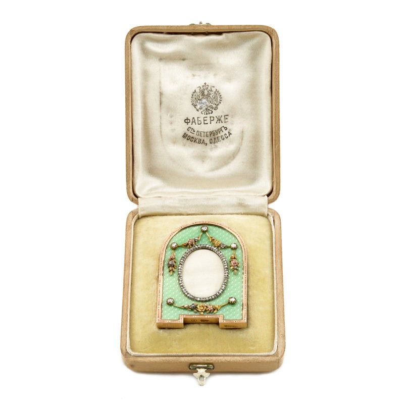 A Fabergé Aarne diamond-set gold & enamel miniature photograph frame in original fitted box