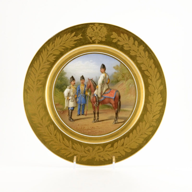 A Russian Imperial Porcelain Factory Military Plate with His Majesty's Own Muslim Convoy
